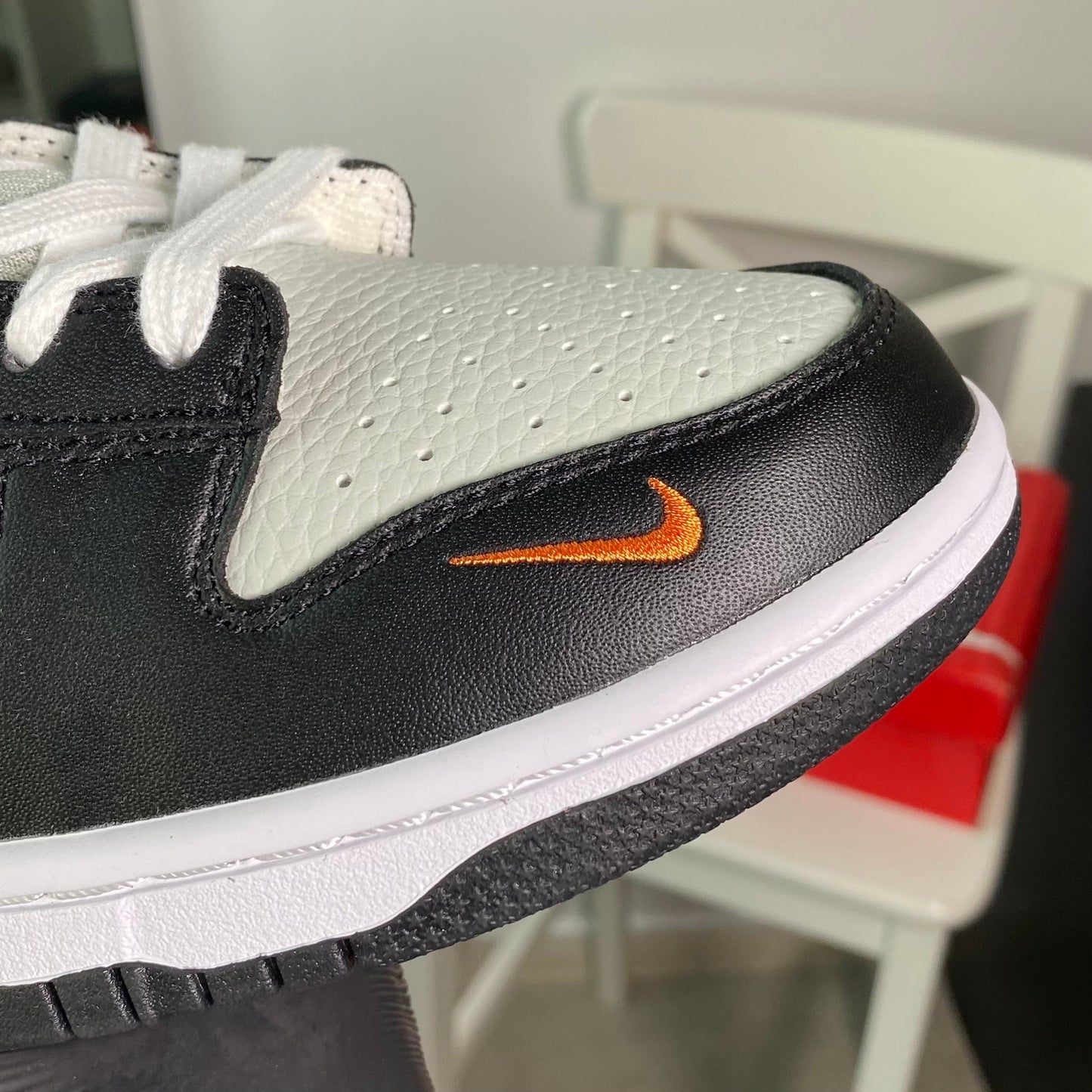 Nike Dunk Low “Black Bright Mandarin Mini Swoosh”