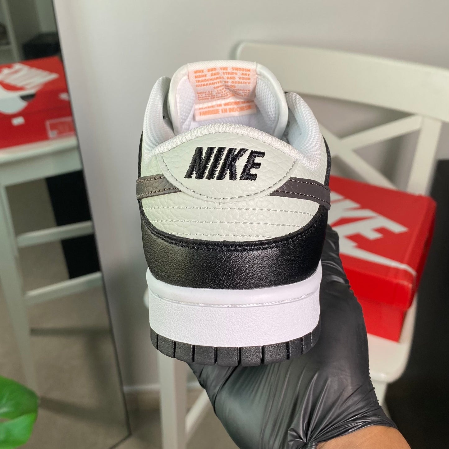 Nike Dunk Low “Black Bright Mandarin Mini Swoosh”