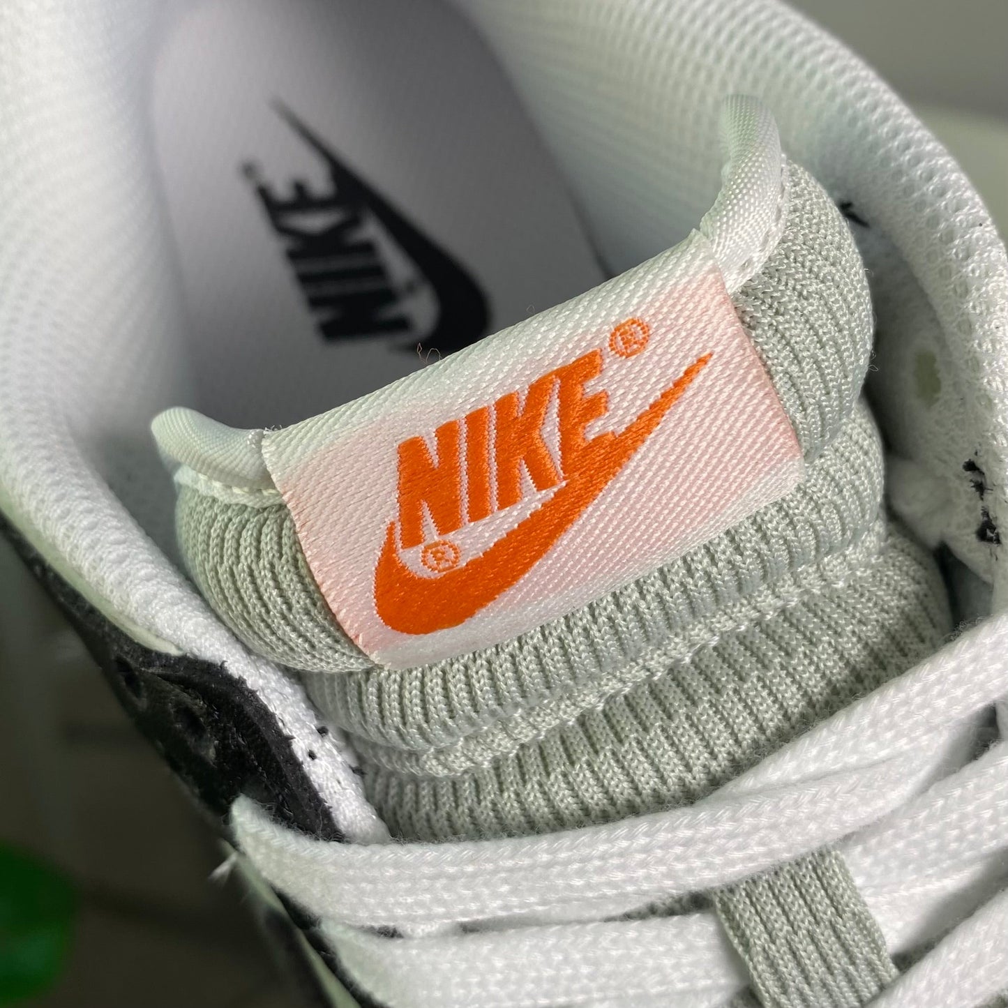 Nike Dunk Low “Black Bright Mandarin Mini Swoosh”